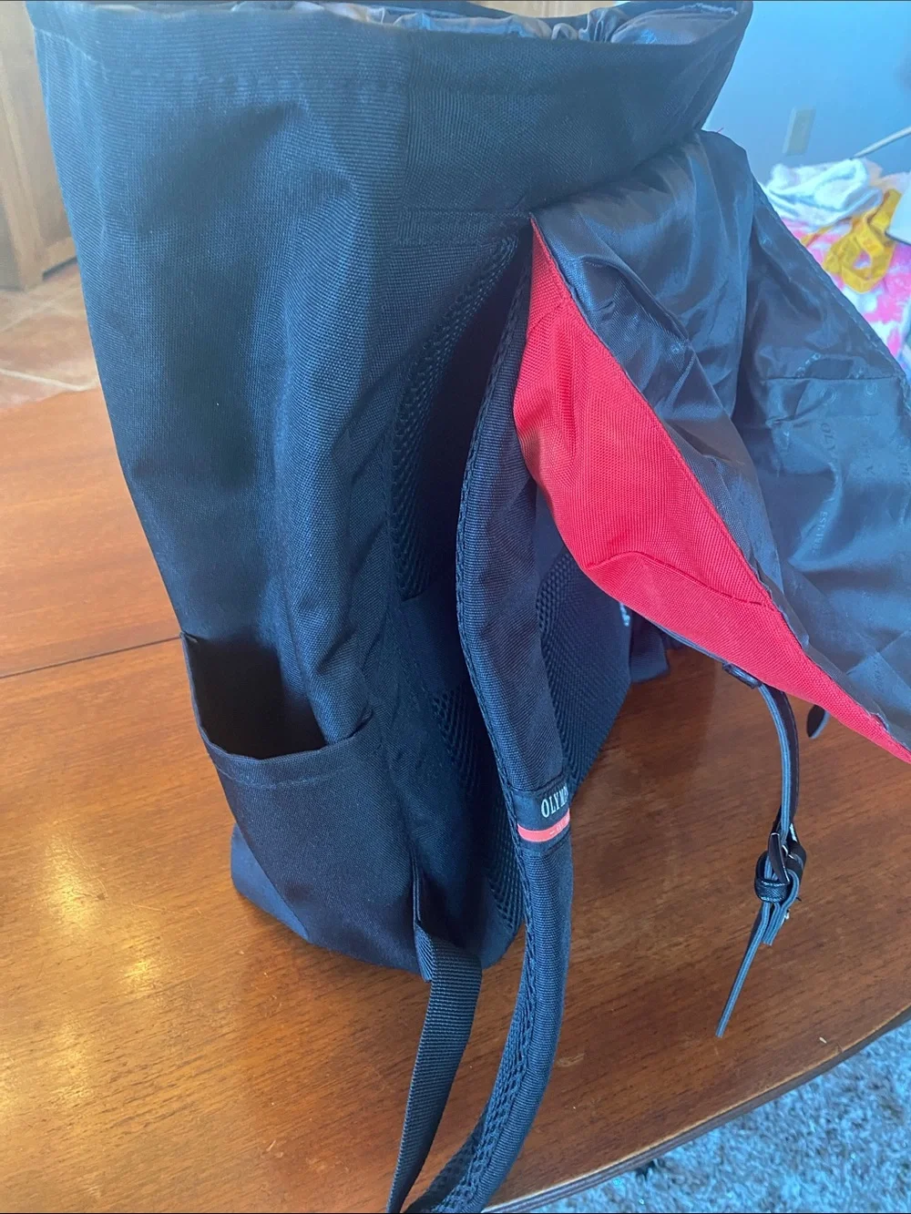 Olympia Activewear Red and Black Canvas Backpack with Front Pocket